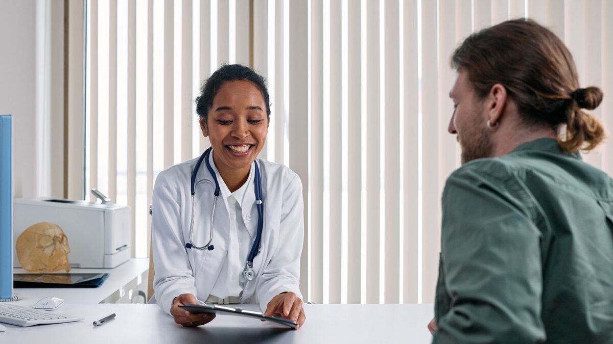 Doctor discussing care and network options with a patient